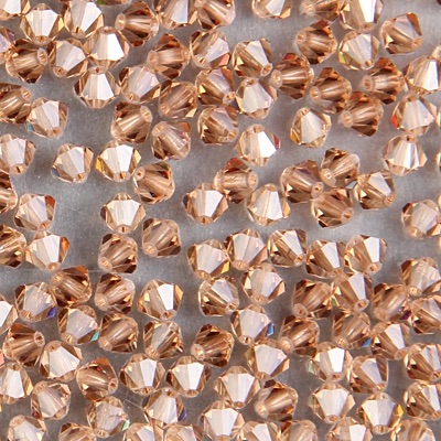 284-190:  5328 4mm bicone  Lt Smoke Topaz (36 pcs) - Discontinued 