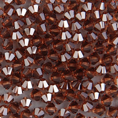 284-260:  5328 4mm bicone  Smoke Topaz (36 pcs) - Discontinued 