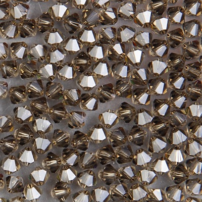 284-265:  5328 4mm bicone  Smoky Quartz (36 pcs) - Discontinued 
