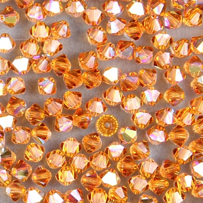 284-286:  5328 4mm bicone  Topaz AB (36 pcs) - Discontinued 