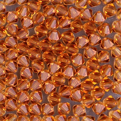 285-285:  5328 5mm bicone Topaz (36 pcs) - Discontinued 