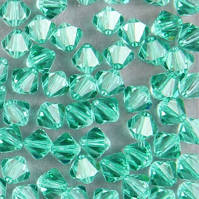 286-165:  5301 6mm bicone  Lt Emerald (36 pcs) 