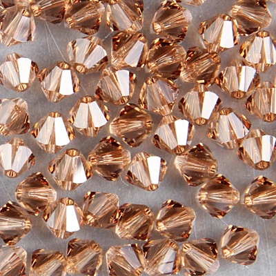 286-190:  5328 6mm bicone  Lt Smoke Topaz (36 pcs) 