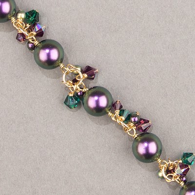 29-1253:  5810 12mm Iridescent Purple Crystal Pearl - 29-1253