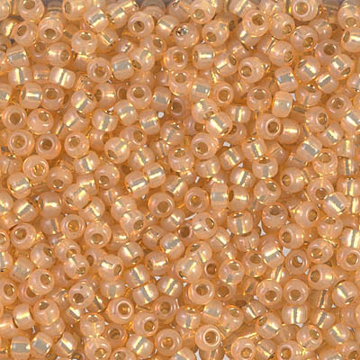 8-552:  8/0 Dyed Light Apricot Silverlined Alabaster Miyuki Seed Bead 