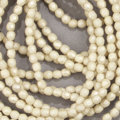 CZF-1045: 4mm Czech Fire Polished - Op Ivory Gold Luster (50 pcs) 