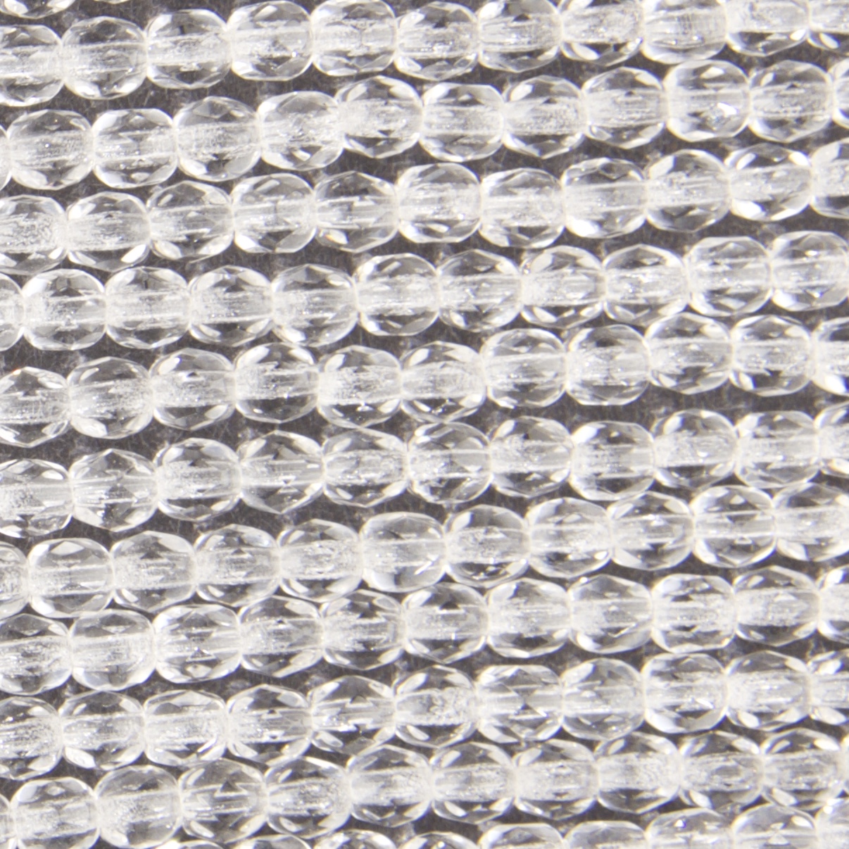 CZF-1145: 4mm Czech Fire Polished - Crystal (50 pcs) 