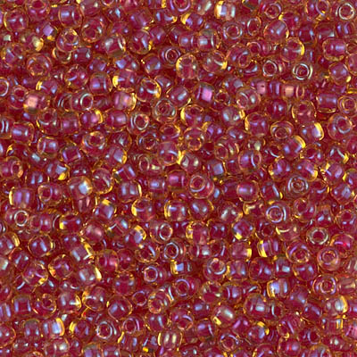 TR10-1164:  Miyuki 10/0 Triangle Cranberry Lined Topaz Luster 