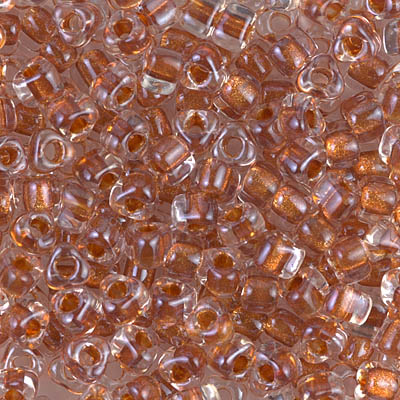 TR5-1551:  Miyuki 5/0 Triangle Sparkling Ginger Lined Crystal 