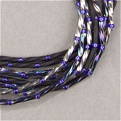 TW2712-401F:  Miyuki 2.7x12mm Twisted Bugle Bead Matte Black - TW2712-401F*